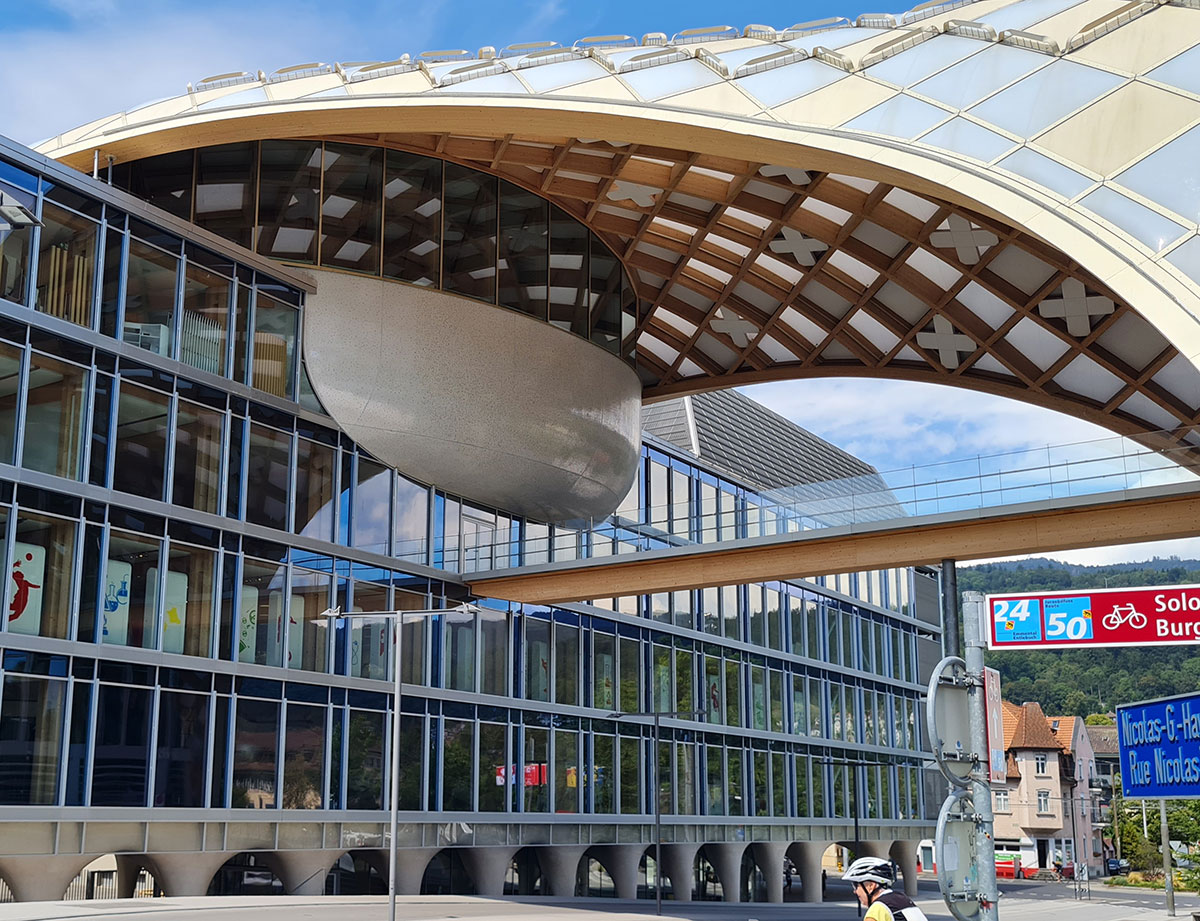 The finished inclined façade of the conference center at the Swatch Group headquarters